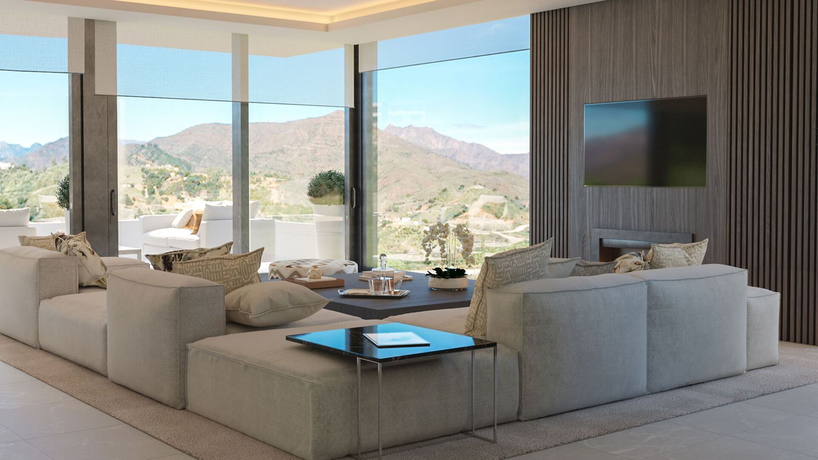 Salon moderne avec vue panoramique sur les montagnes à Elysium Golf.