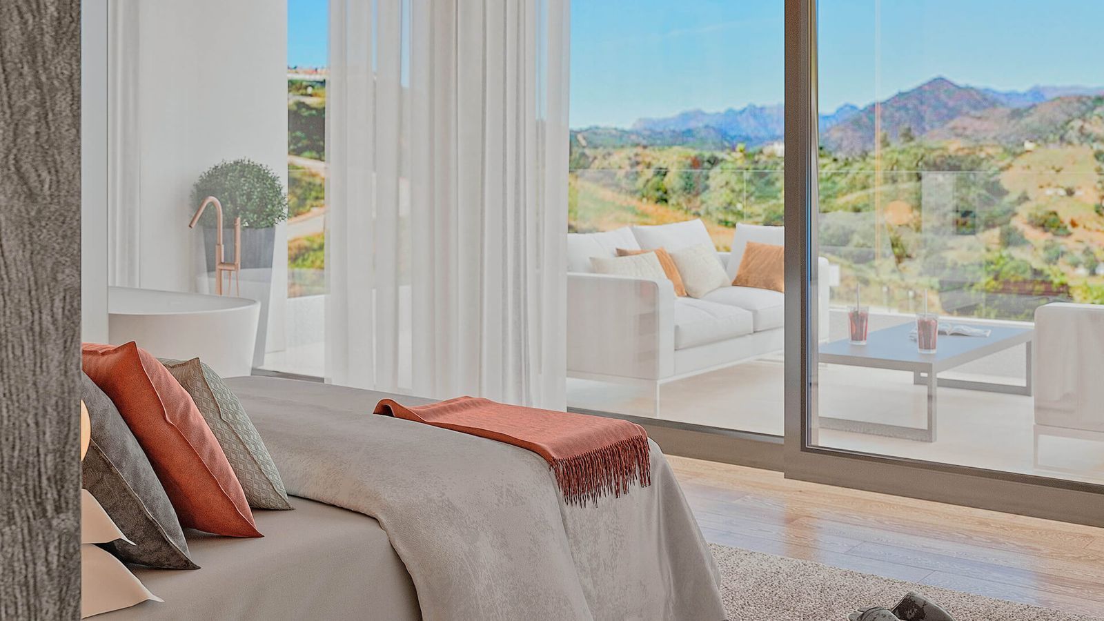 Chambre luxueuse avec vue sur les montagnes et coin salon sur le balcon.